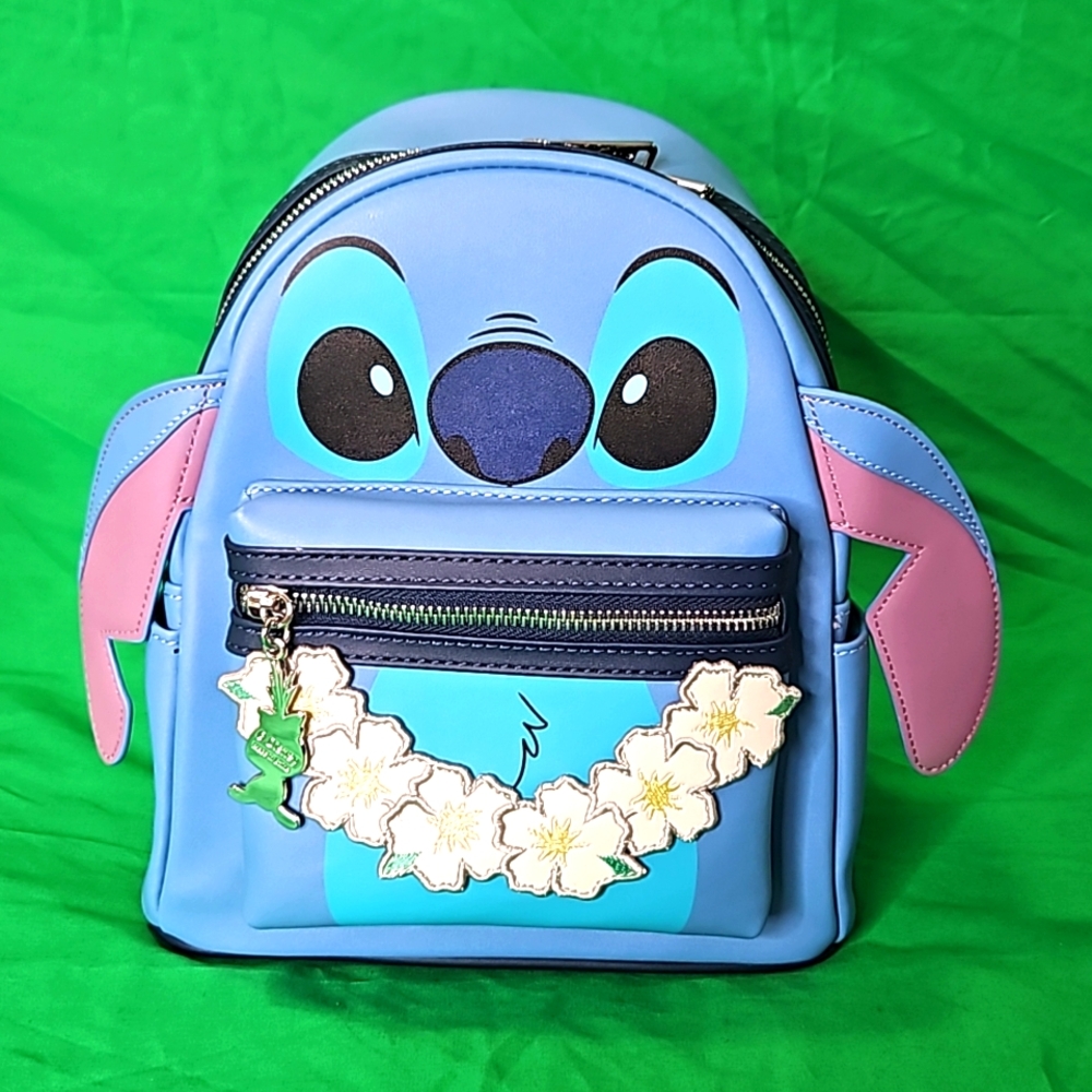 Loungefly Stitch with a lei around it's neck and ears